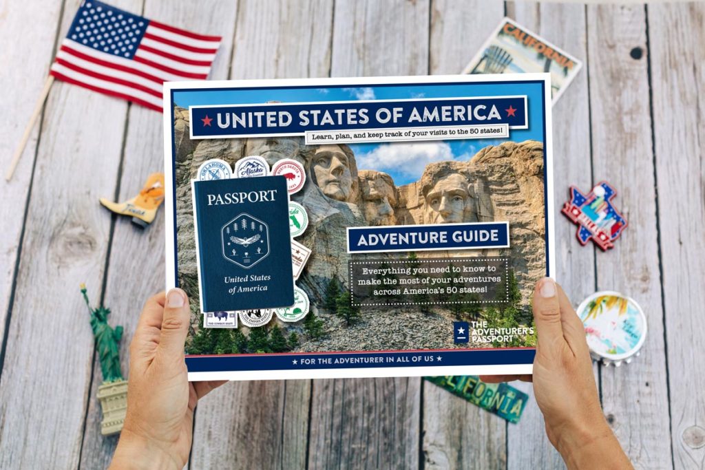 The-Adventurer's-Passport-Cover-Presentation-In-Hands